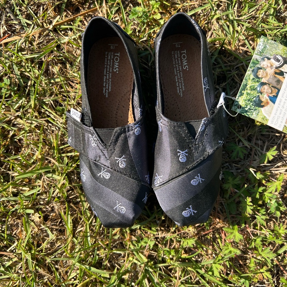 Toms Kids Black Slip-On Shoes with White Skull Print